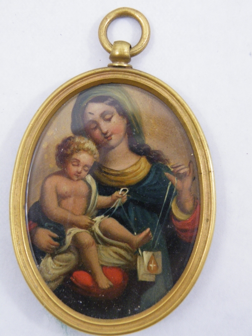 A late 19th /early 20th portrait miniature of Virgin Mary & child - in brass oval frame - 9cm inc