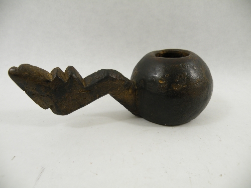 An African wooden tribal drinking vessel with carved handle, possibly a witch doctors bowl. 20cm