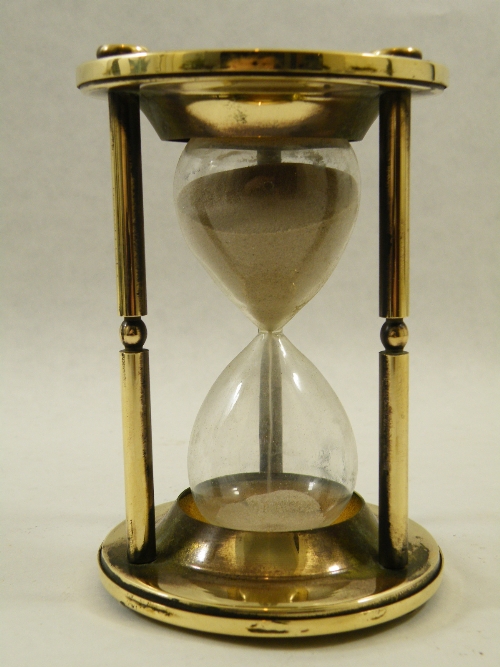 A 19th C brass cased glass egg timer