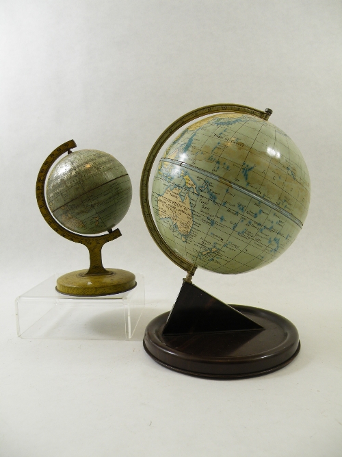 Two tin plate table globes: the larger marked Chad Valley 28cm with a wood effect print on tin