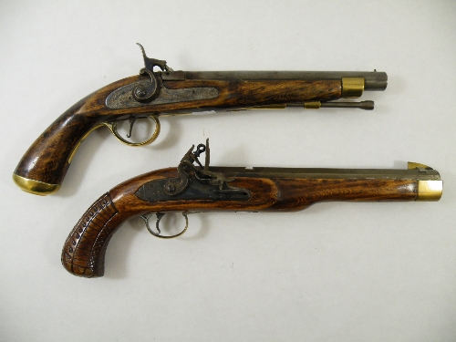 Two black powder pistols - one a Jukar flintlock (ramrod missing) 39cm together with a percussion