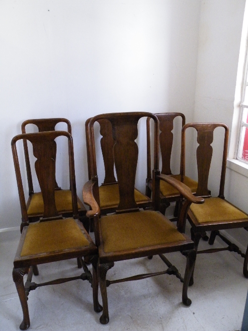 A set of six 19th C oak Queen Anne style country dining chairs with urn shaped splat with turned