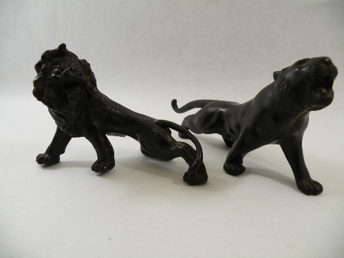 JAPANESE LATE MEIJI PERIOD PATINATED BRONZE MODEL OF A SNARLING TIGER, modelled outstretched, with
