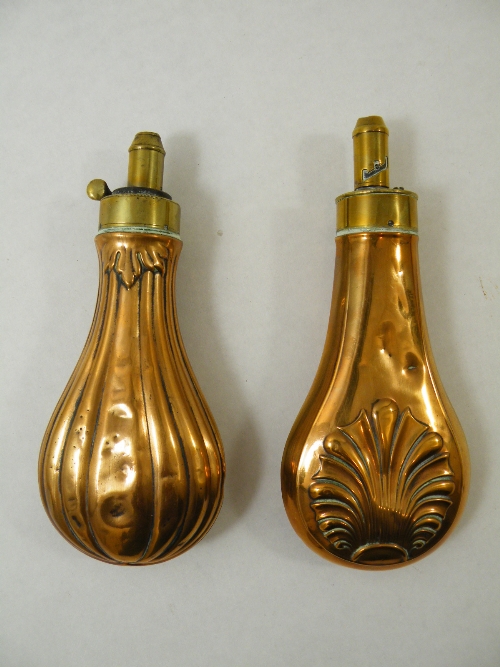 A James Dixon & Sons powder flask, the body embossed with stylised acanthus leaf design, the brass