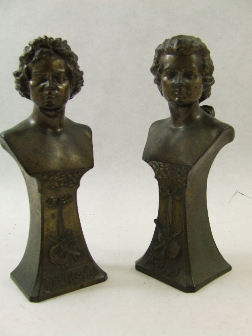 Pair of Art Nouveau bronzed metal busts of composers Mozart and Beethoven on sinuous plinths each