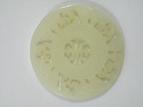A jade open carved pendant.