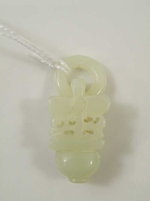 A Chinese Celadon jade two piece carved pendant 4cm