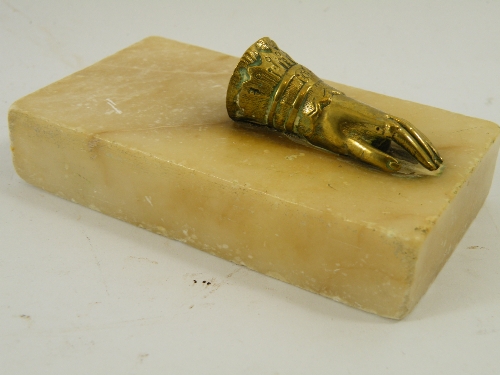 A marble Victorian desk weight with a mounted brass / bronze model of a ladies bejeweled hand 13cm x