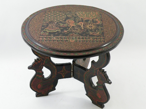 Handpainted Burmese black lacquer folding table - the top and centre legs with finely painted detail