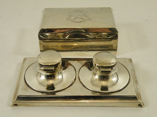 A silver inkstand with hallmarks for Birmingham 1911/12 makes mark WA and a silver cigarette box,
