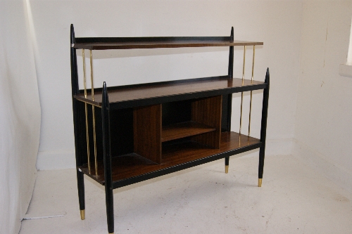 Retro/Mid Century: G Plan style 1950`s ebonised wood & mahogany record shelf on rocket feet & having