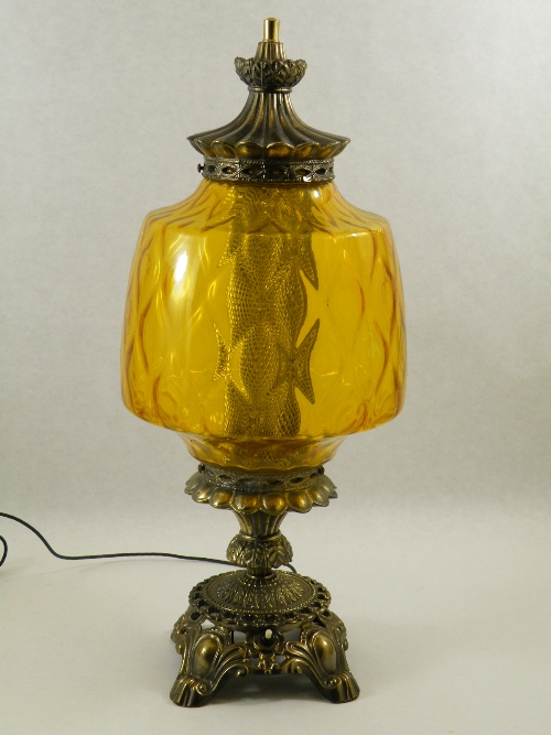 A large gilt metal amber glass table lamp with gilt mounts 64cm H