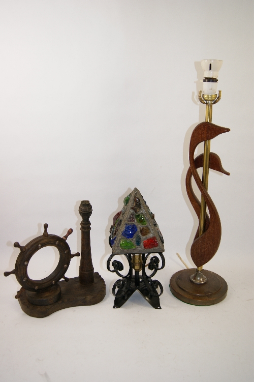 Three mid 20th C table lamps, a novelty wooden lamp of a lighthouse & ships wheel 28cm tall, a