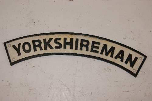 A hand painted cast metal sign of "Yorkshireman" in white & black. 65cm