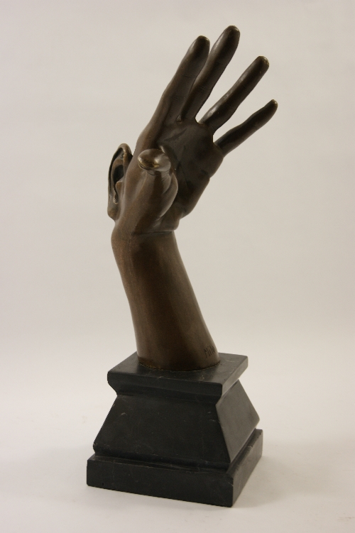 Surrealist bronze sculpture modelled as raised hand with incorporated ear, impressed signature Milo,