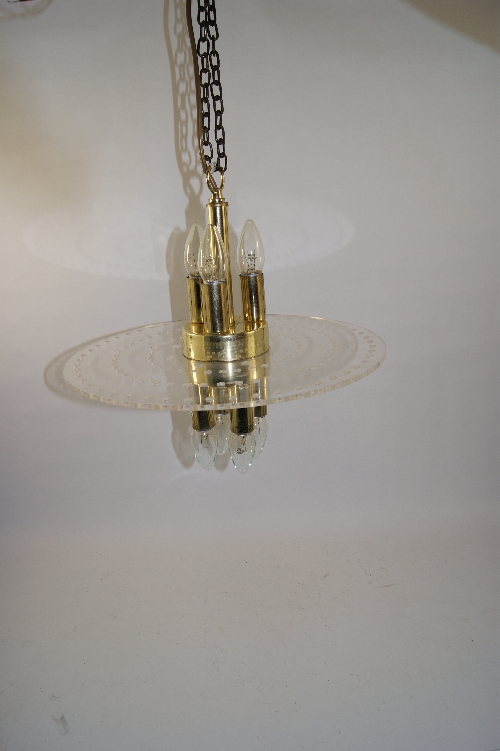 A retro 1970`s Italian style feature light comprising 6 candle bulbs with intersected perspex