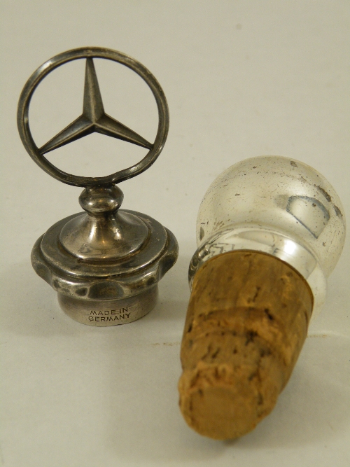 White metal (not hall marked) Continental bottle stopper  modelled as a small Mercedes Benz radiator