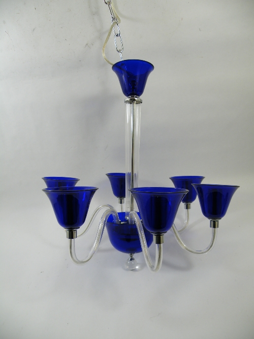 Interior design/ Contemporary furnishings: Impressive contemporary Murano blue and clear glass six