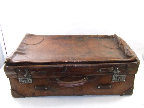 Early 20th Century brown leather suitcase with square leather covered corners, leather handles to