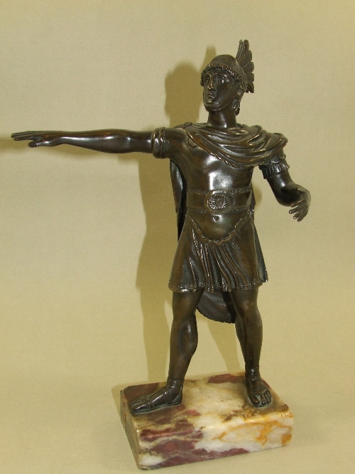 A well cast late 19th C bronze figure of a Roman Centurion in full military dress -nut brown