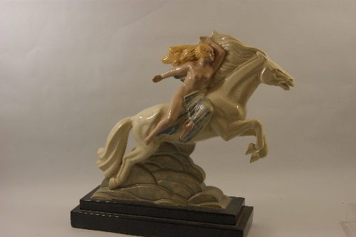 An impressive French Art Deco crackle glaze figural group of naked female on horseback, the horse