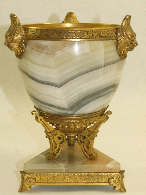 An impressive 19th C agate urn shaped vase with Ormolu mounts with three three lion masks standing