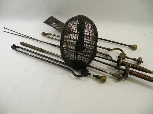 Four antique fire irons, a fencing mask and 2 epee