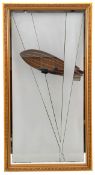 An etched Mirror showing an airship framed by searchlights. An interesting and attractive mirrored