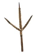 A good 19th century Gilbert Islands triple bladed wood dagger, blades mounted with small sharks