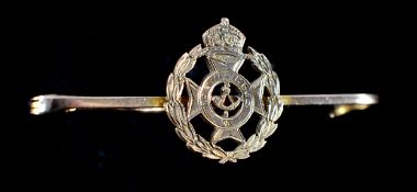 Robin Hood Rifles badge bar brooch, flat with King’s crown above wreath, of yellow metal, (