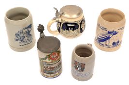 A quantity of modern beer steins. 7 modern souvenir stone wear open topped beer steins,
