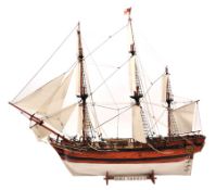 A scale model of the Royal Navy’s H.M.S. Bounty The model is of plank on frame construction, well