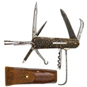 A 19th century multi bladed pocket knife, with corkscrew, large blade, button hook, awl, nail