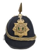 A post 1902 Other Ranks’ blue cloth spiked helmet of the Royal Guernsey Light Infantry, rounded back