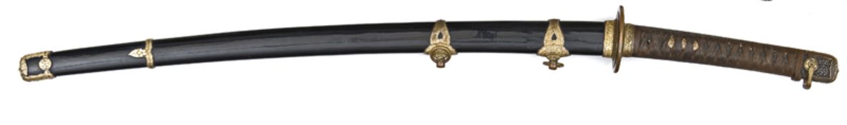 A Japanese WWII naval officers’ sword Katana, c 1940, highly polished blade 25¼”, pronounced