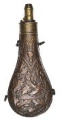 A copper powder flask “Oak Leaf” (Riling 577) brass top, the nozzle marked “G & J W Hawksley” and
