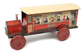 An unusually large Brimtoy (Mettoy) tinplate single deck bus. In red Swift livery with passenger and