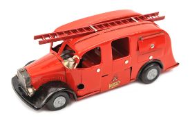 A Tri-ang Minic clockwork Streamlined Fire Engine, 62M. A post WW2 example In red livery with