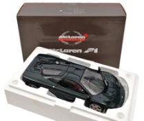 A limited issue Pauls Model Art 1:12 scale McLaren F1 Sports Car. Example in metallic British Racing