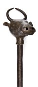 An early 19th century Indian iron bull’s head mace, of hollow construction, the head with