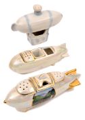 3 period china souvenir Zeppelin shaped cruet sets. A short example 13cm in white glaze, with