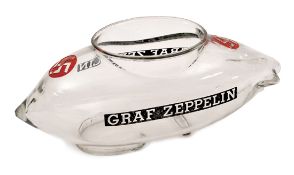 An interesting clear glass container in the form of a Zeppelin. A period piece from the 1930’s