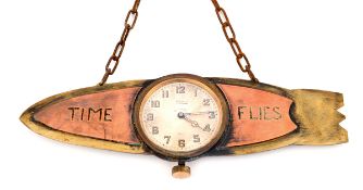 Mappin 8 day watch set into a brass and copper silhouette of an airship. Engraved by eye “Time