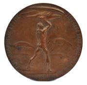 A large 18.5cm bronze plaque, ‘For Service To The Zeppelin-Eckener Fund. Naked man launching an