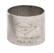 Destruction of L33 – Souvenir Napkin Ring. Aluminium alloy Napkin Ring (5cm diameter, 4cm high).