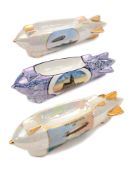 3 period china souvenir Zeppelin shaped cruet sets. All 17.5cm 2 with mother of pearl finish and one