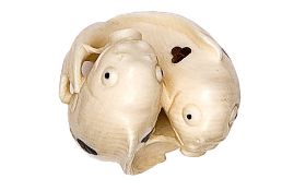 A Japanese ivory netsuke in the form of 2 carp swimming around each other. GC Plate 11