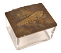 Glass box with brass lid – showing relief image of LZ III. Small rectangular clear glass box (