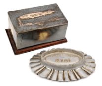 An English cigarette box. Silver plated tin with a hinged impressed picture lid of the R.101 airship