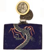 A Japanese dark blue leather purse, with large woven dragon overall and metal dragon clasp, 2